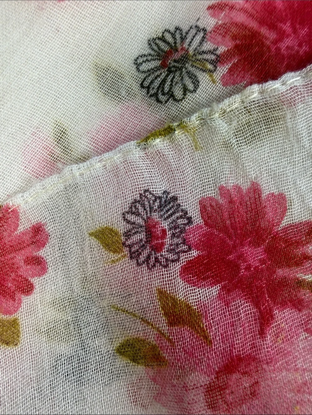 Red and pink daisy floral print scarf on gauzy sheer white background
